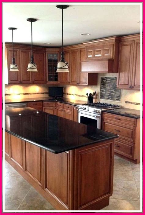 black stainless steel appliance oak cabinets|kitchen remodels with oak cabinets.